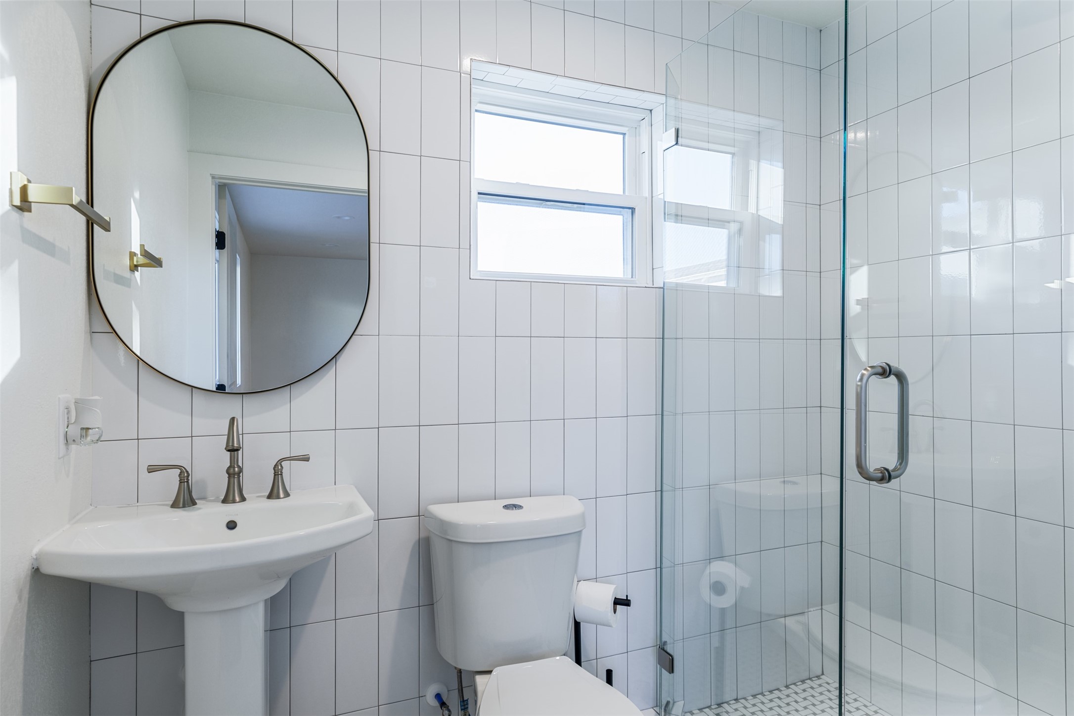 1535 Rutland Street Houston, TX 77008 - Photo 41 of 50 a bathroom with a sink toilet and shower