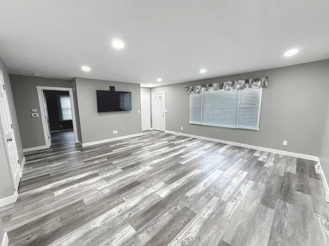 a view of a livingroom with a window