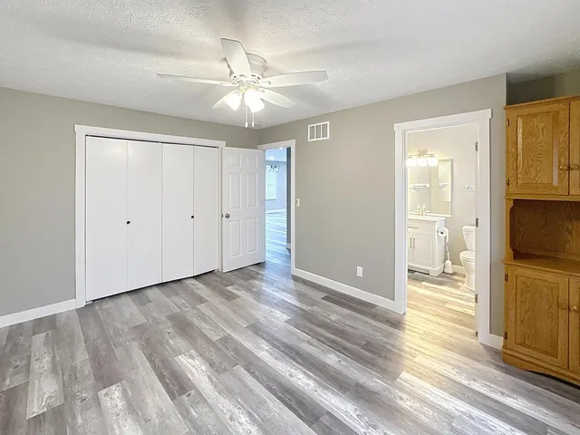 a view of a livingroom with wooden floor
