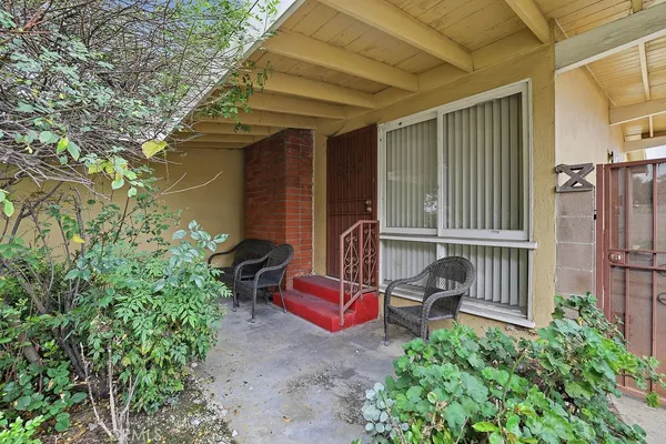 a view of a porch with furniture