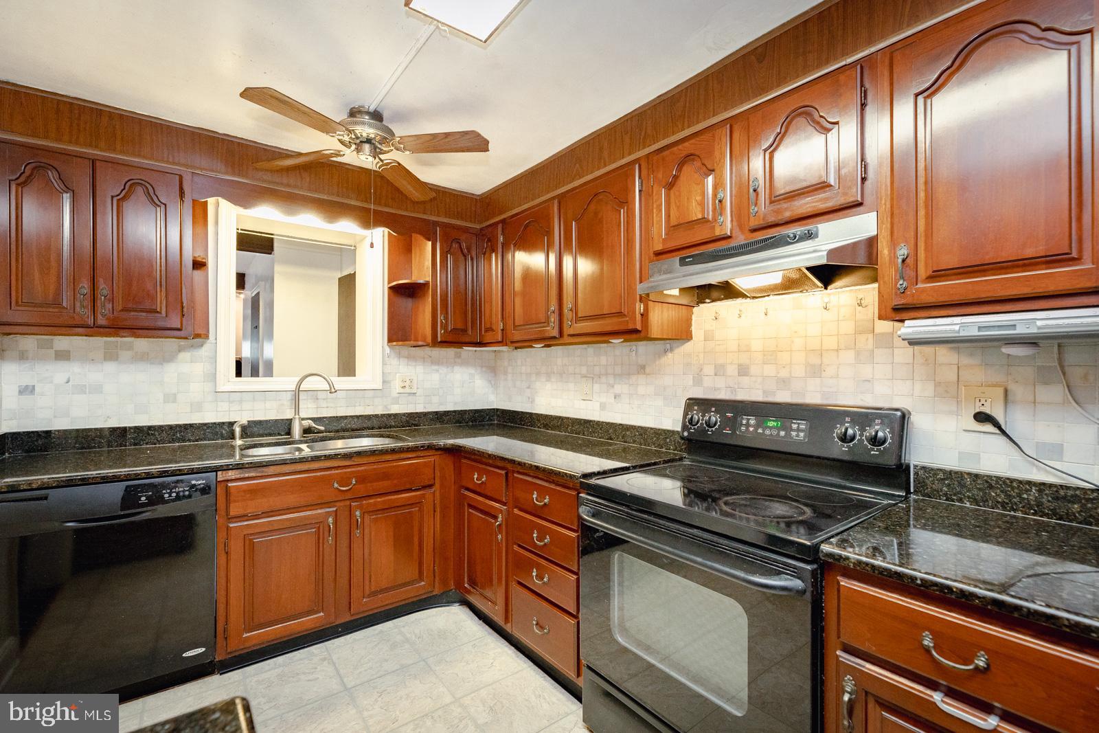 119 Valley View Road Media, PA 19063 - Photo 16 of 44 Kitchen with Pass Through to Family Room