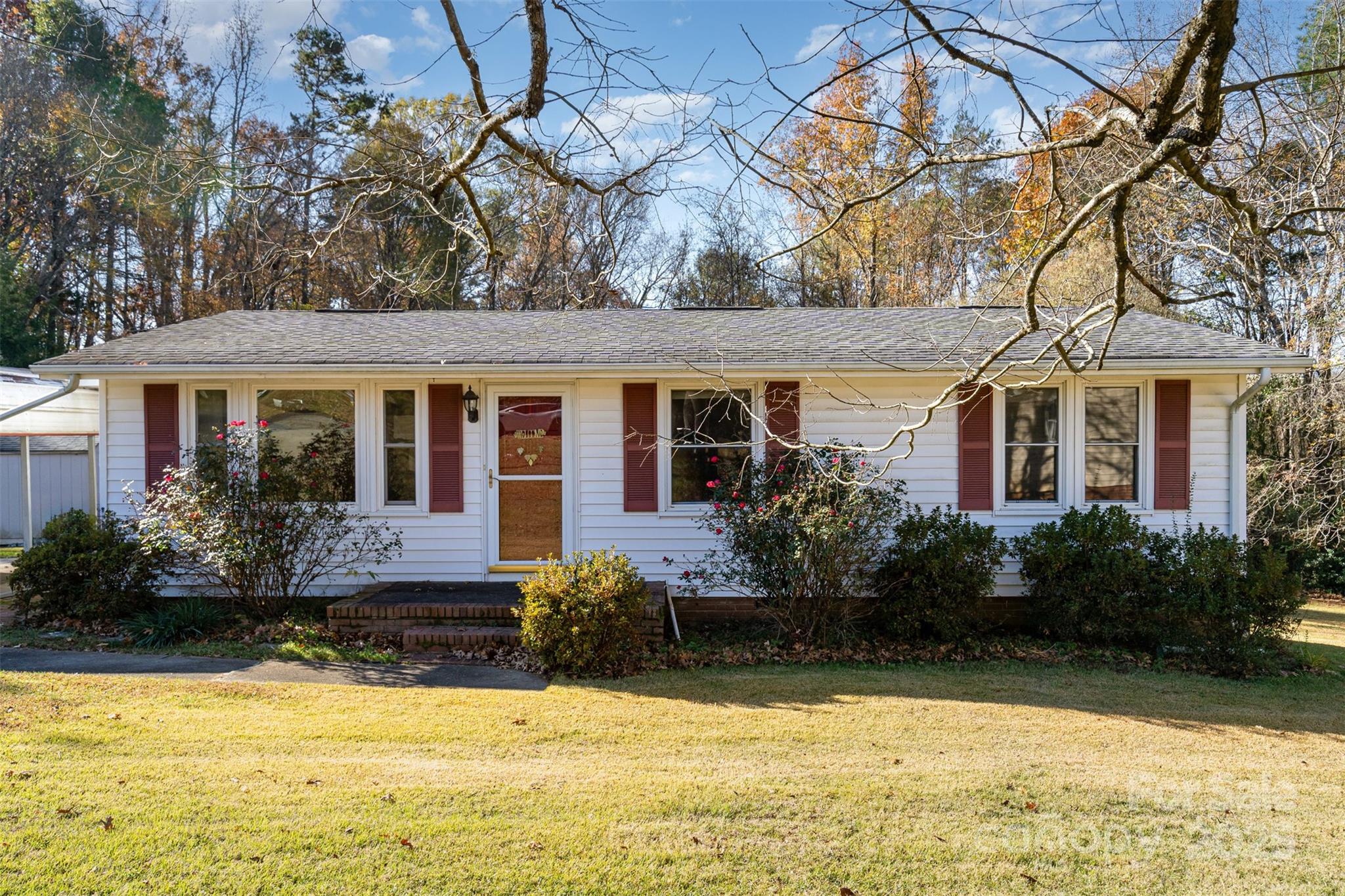 650 Rama Wood Drive Southeast Concord, NC 28025 - Photo 2 of 17 a view of a house with swimming pool