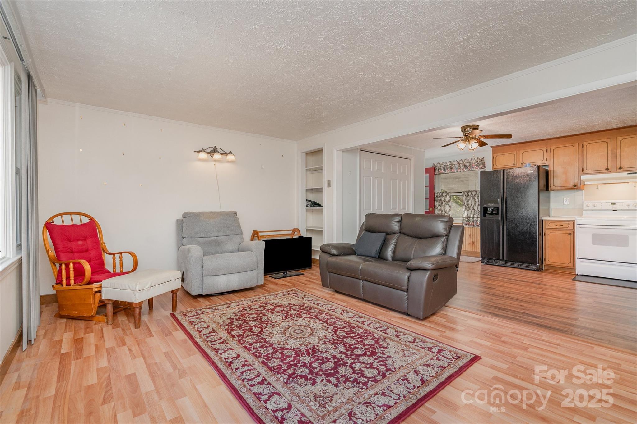 650 Rama Wood Drive Southeast Concord, NC 28025 - Photo 4 of 17 a living room with furniture and wooden floor