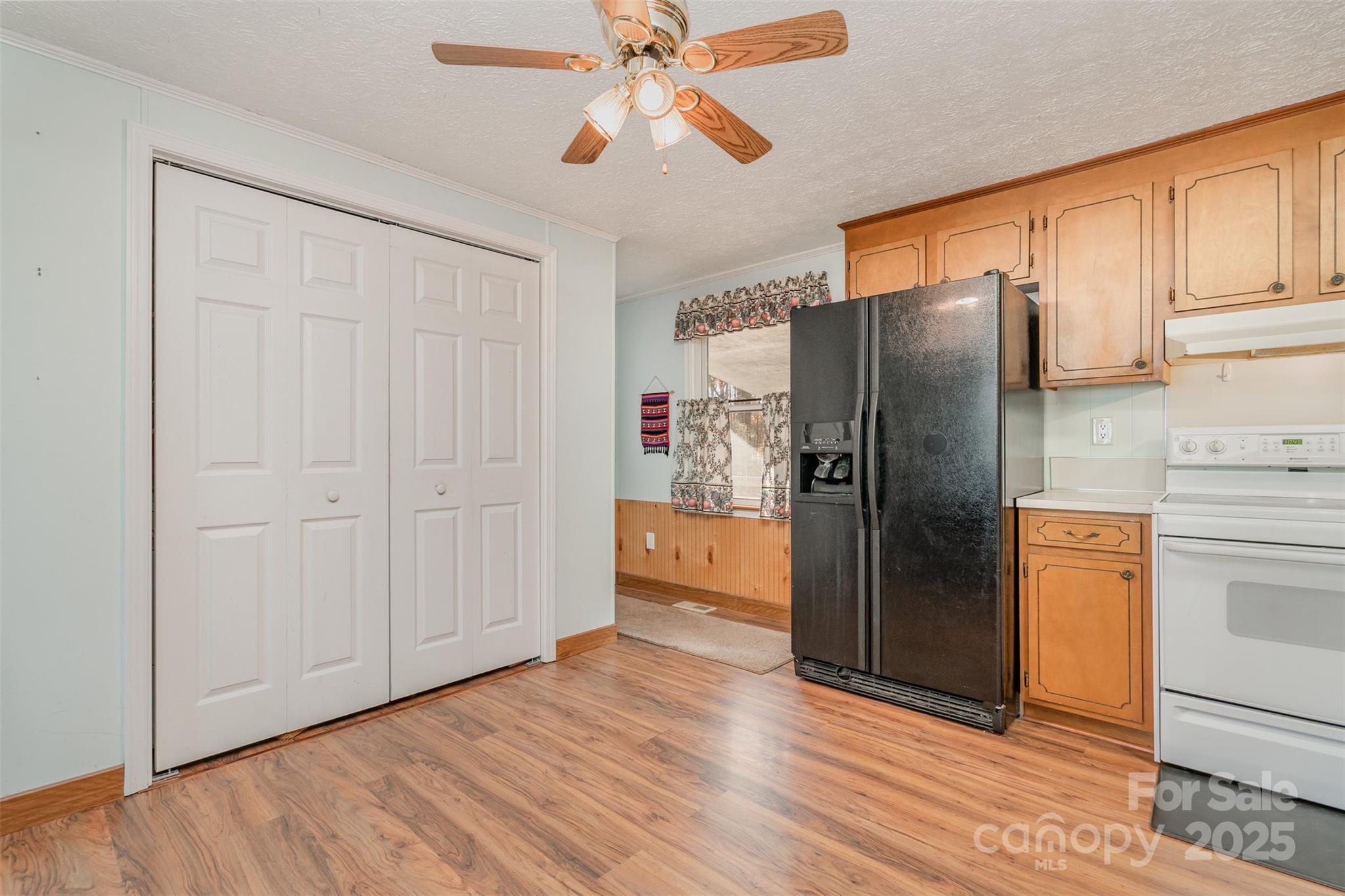 650 Rama Wood Drive Southeast Concord, NC 28025 - Photo 10 of 17 a kitchen with stainless steel appliances granite countertop a refrigerator and a stove top oven