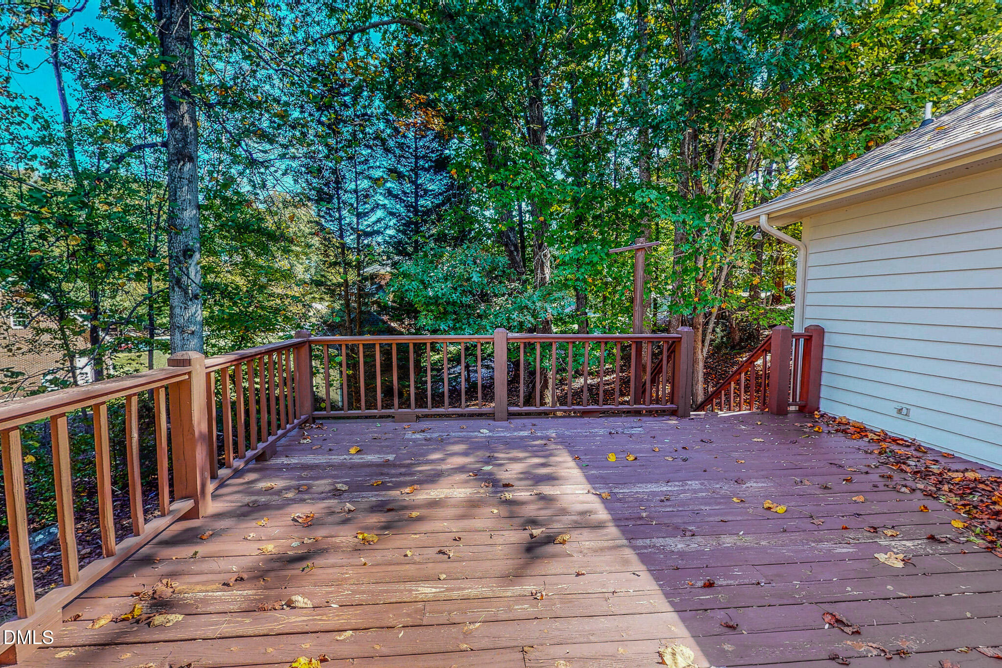 11 Denada Path Roxboro, NC 27574 - Photo 5 of 62 a view of a deck with wooden floor and fence