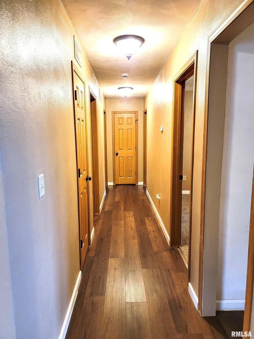 2517 Cherrybark Lane Flora, IL 62839 - Photo 57 of 99 a view of hallway with wooden floor