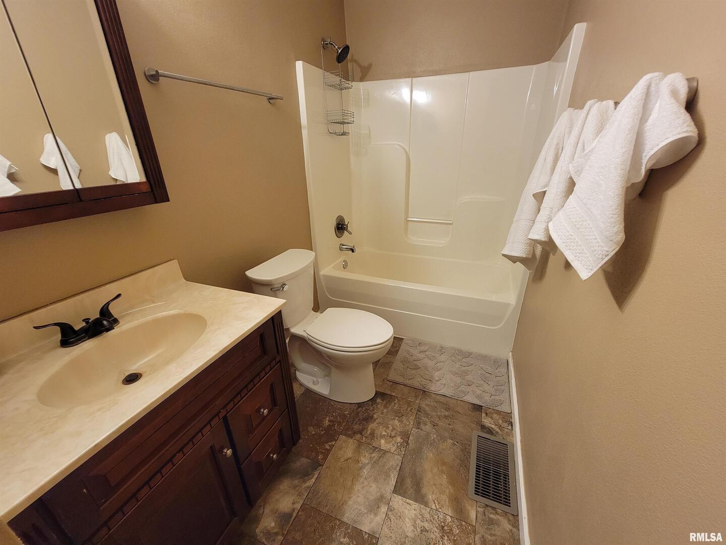 2517 Cherrybark Lane Flora, IL 62839 - Photo 74 of 99 a bathroom with a sink toilet and shower