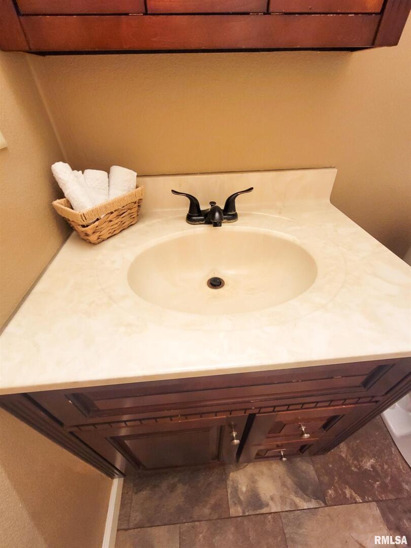 2517 Cherrybark Lane Flora, IL 62839 - Photo 75 of 99 a bathroom with a sink and a mirror