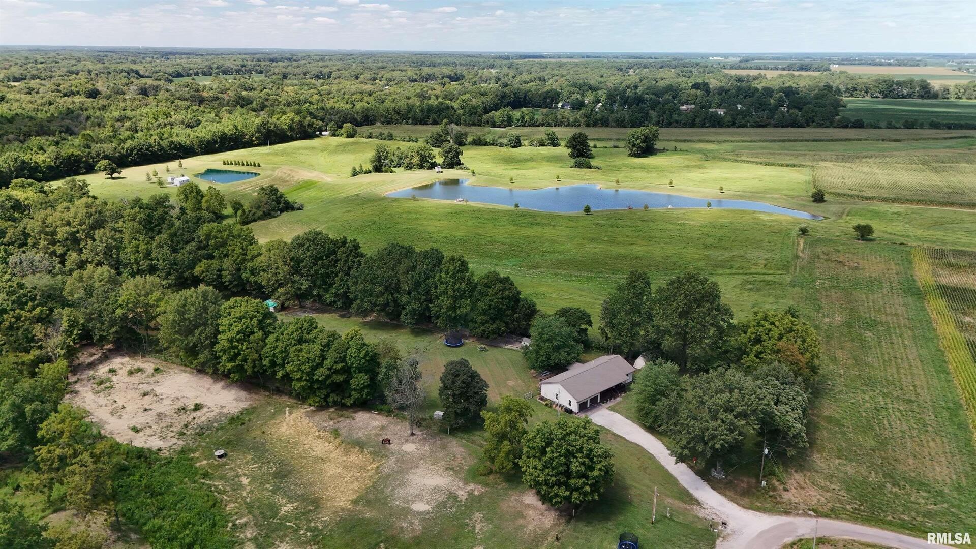 2517 Cherrybark Lane Flora, IL 62839 - Photo 9 of 99 a view of a lake with a yard