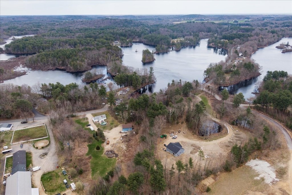 185 Kimball Road Amesbury, MA 01913 - Photo 5 of 24 a view of a houses with a yard