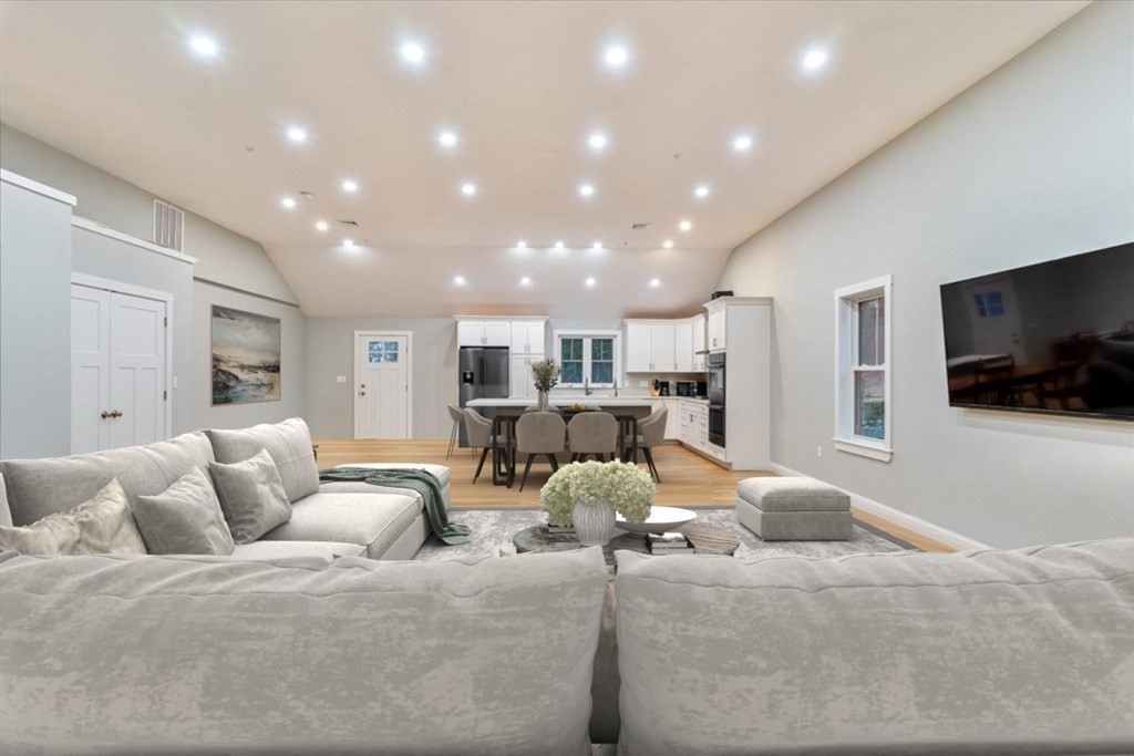 185 Kimball Road Amesbury, MA 01913 - Photo 9 of 24 a living room with furniture and a flat screen tv