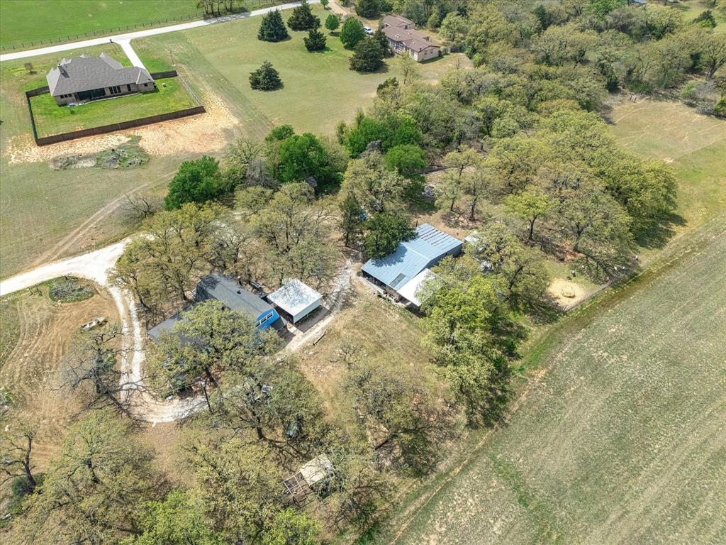 265 County Road 4374 Decatur, TX 76234 - Photo 2 of 32 an aerial view of residential house with outdoor space