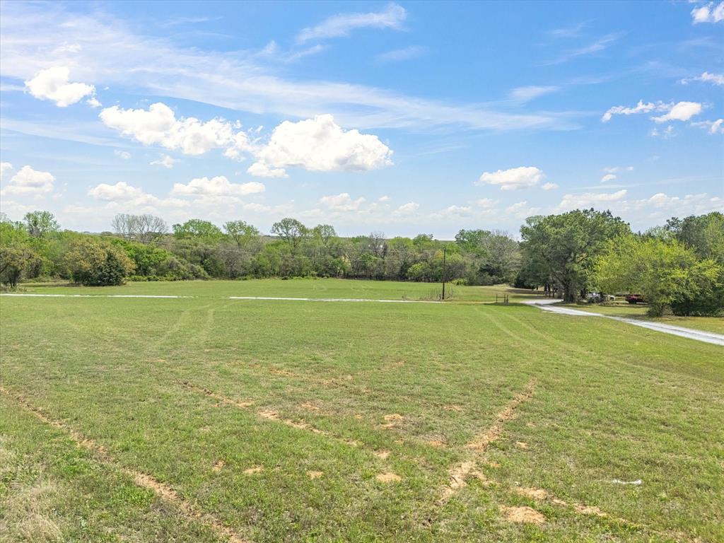 265 County Road 4374 Decatur, TX 76234 - Photo 6 of 32 a view of an ocean and a yard