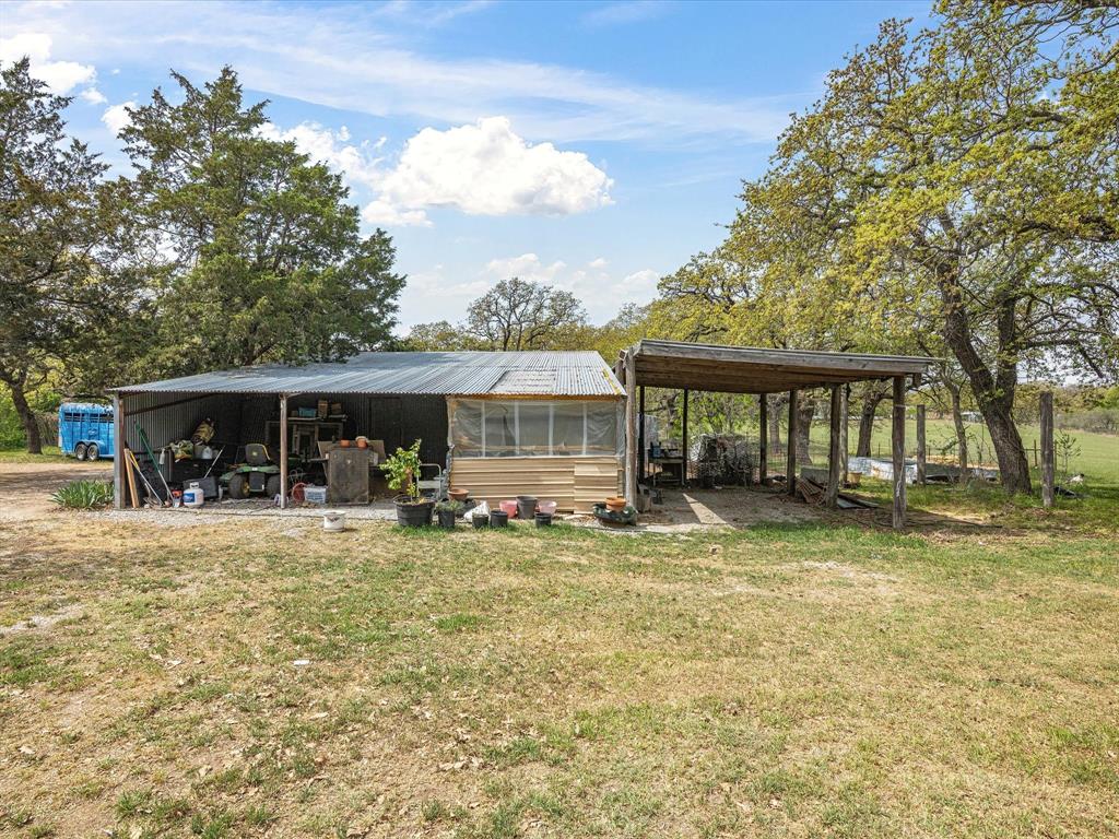 265 County Road 4374 Decatur, TX 76234 - Photo 9 of 32 a view of a house with swimming pool and sitting area