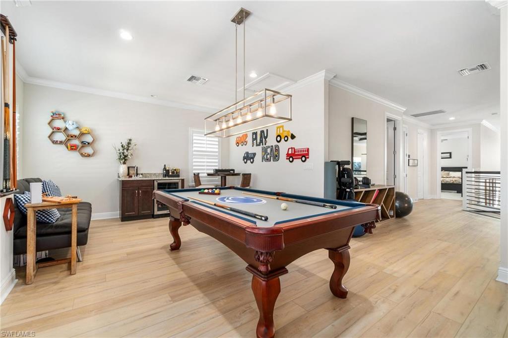 8936 Mustique Lane Naples, FL 34114 - Photo 22 of 29 a room with furniture pool table and window