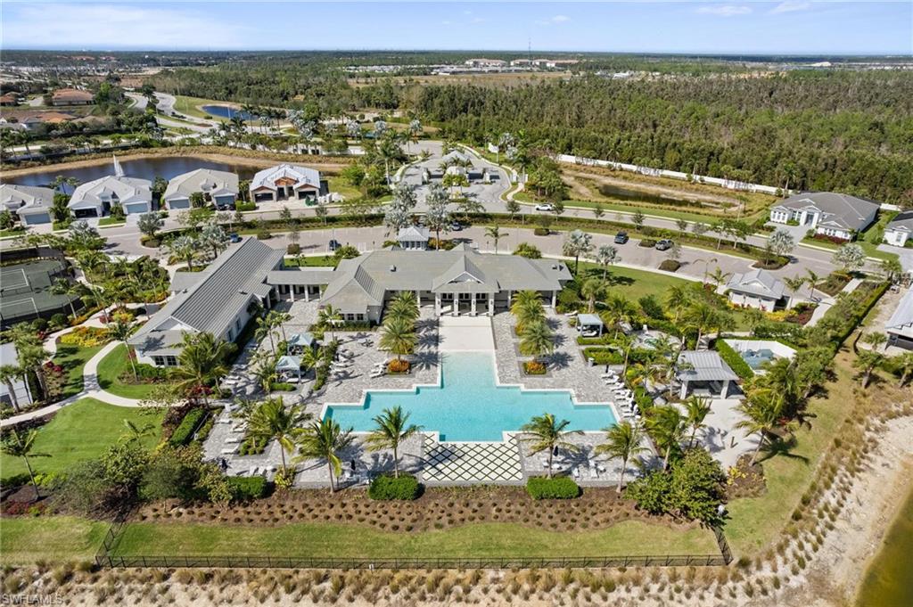 8936 Mustique Lane Naples, FL 34114 - Photo 28 of 29 an aerial view of residential building with outdoor space