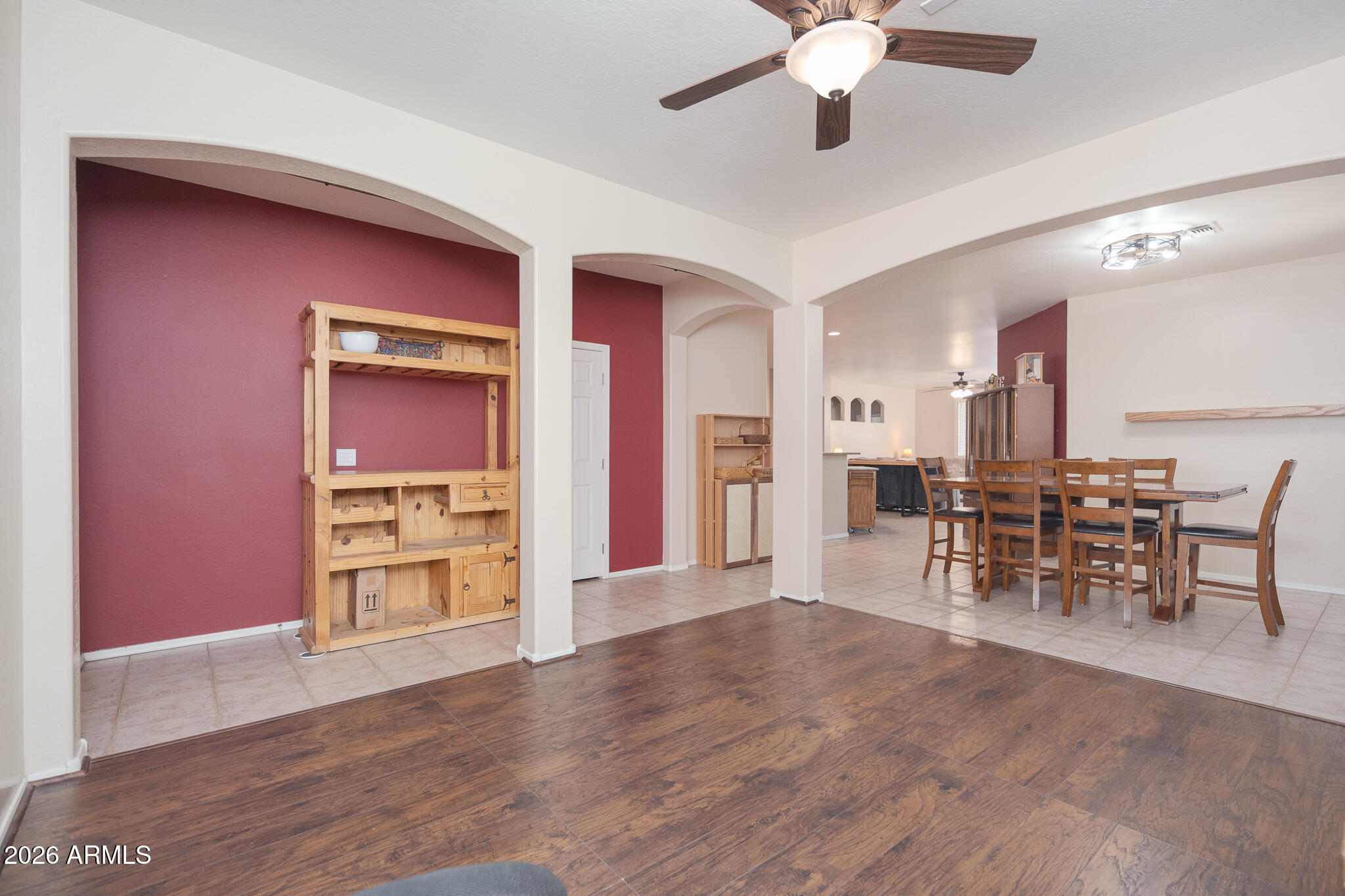 17284 West Madison Street Goodyear, AZ 85338 - Photo 6 of 34 a view of a livingroom with furniture and a kitchen