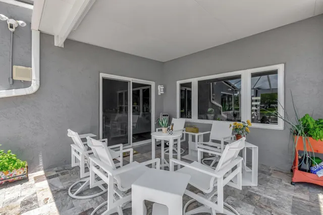 a view of a lake with houses in the back