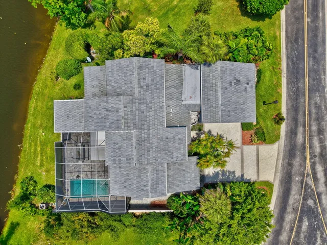 a lobby with furniture and floor to ceiling window