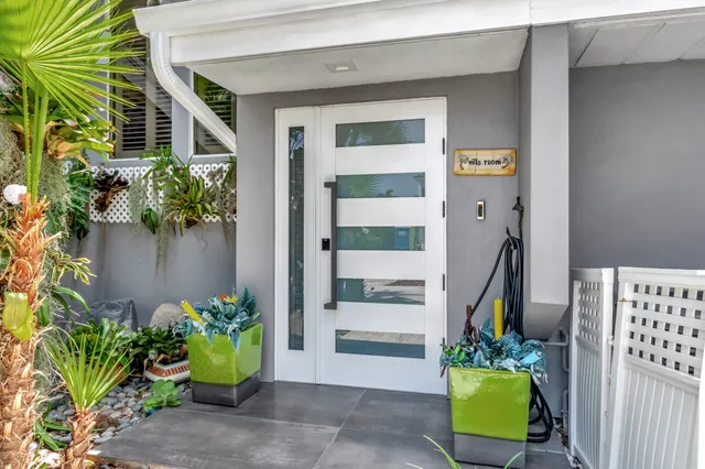a view of swimming pool with a table and chairs