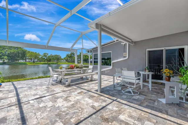 a view of a lake with a building in the background