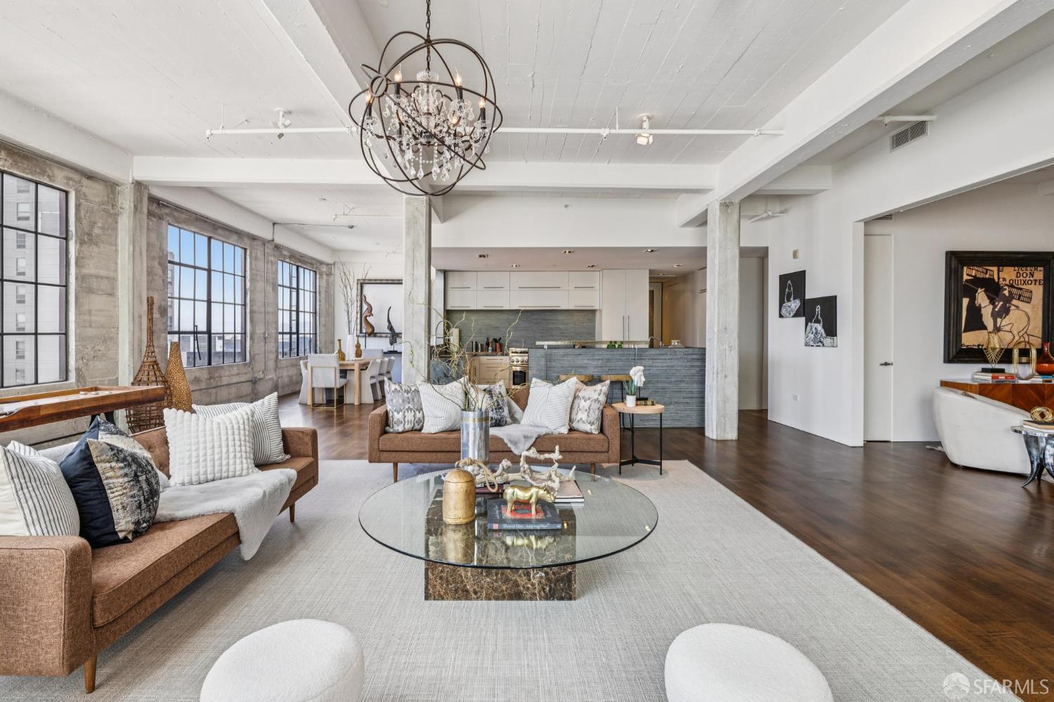 6 Mint Plaza, Unit 900A San Francisco, CA 94103 - Photo 12 of 55 a living room with furniture and a chandelier