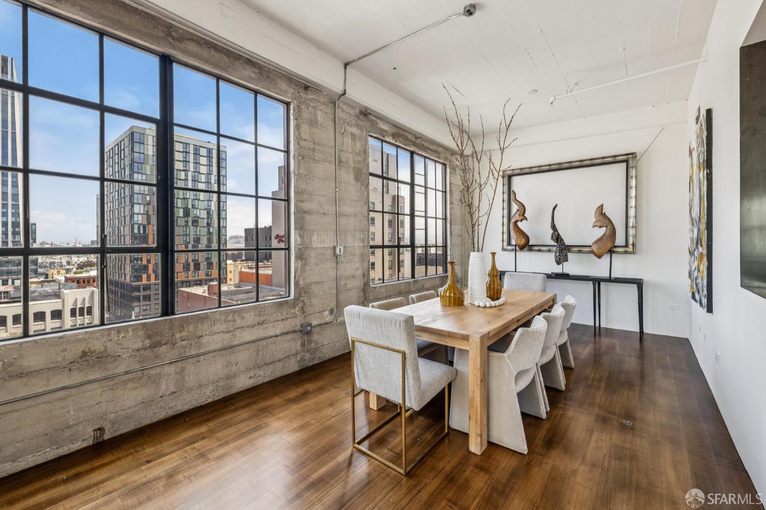 6 Mint Plaza, Unit 900A San Francisco, CA 94103 - Photo 13 of 55 a view of a dining room with furniture window and wooden floor