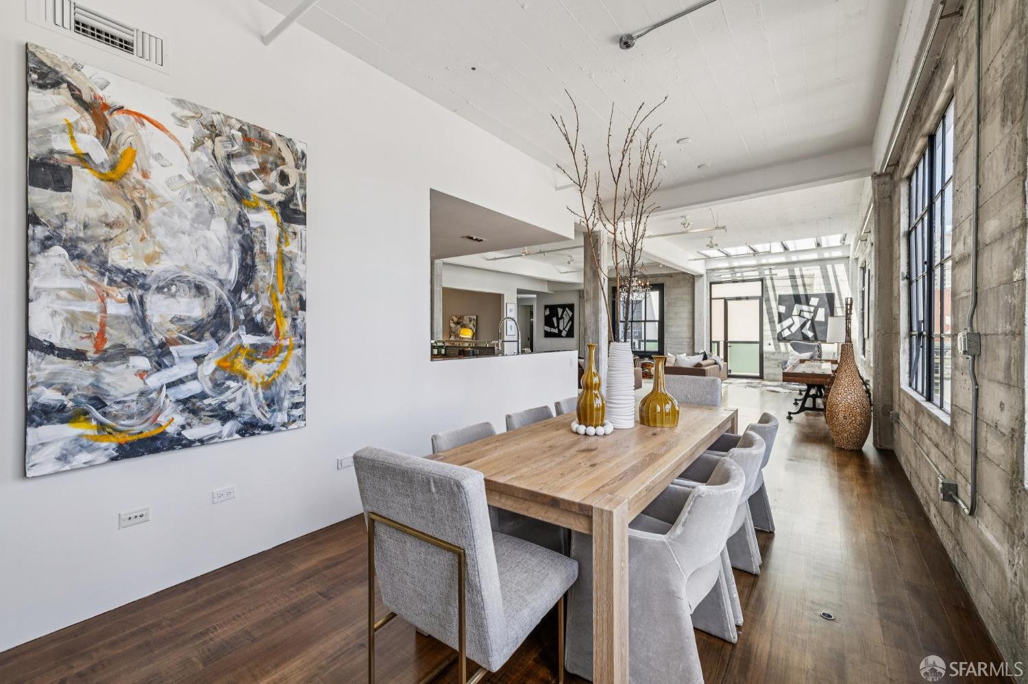 6 Mint Plaza, Unit 900A San Francisco, CA 94103 - Photo 14 of 55 a view of a dining room with furniture and wooden floor