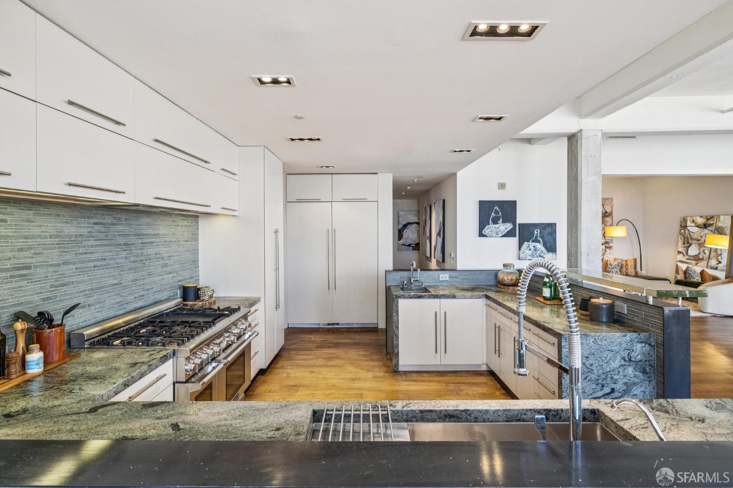 6 Mint Plaza, Unit 900A San Francisco, CA 94103 - Photo 16 of 55 a kitchen with a stove window and cabinets