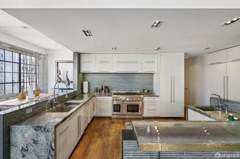 a view of a fireplace with cabinet