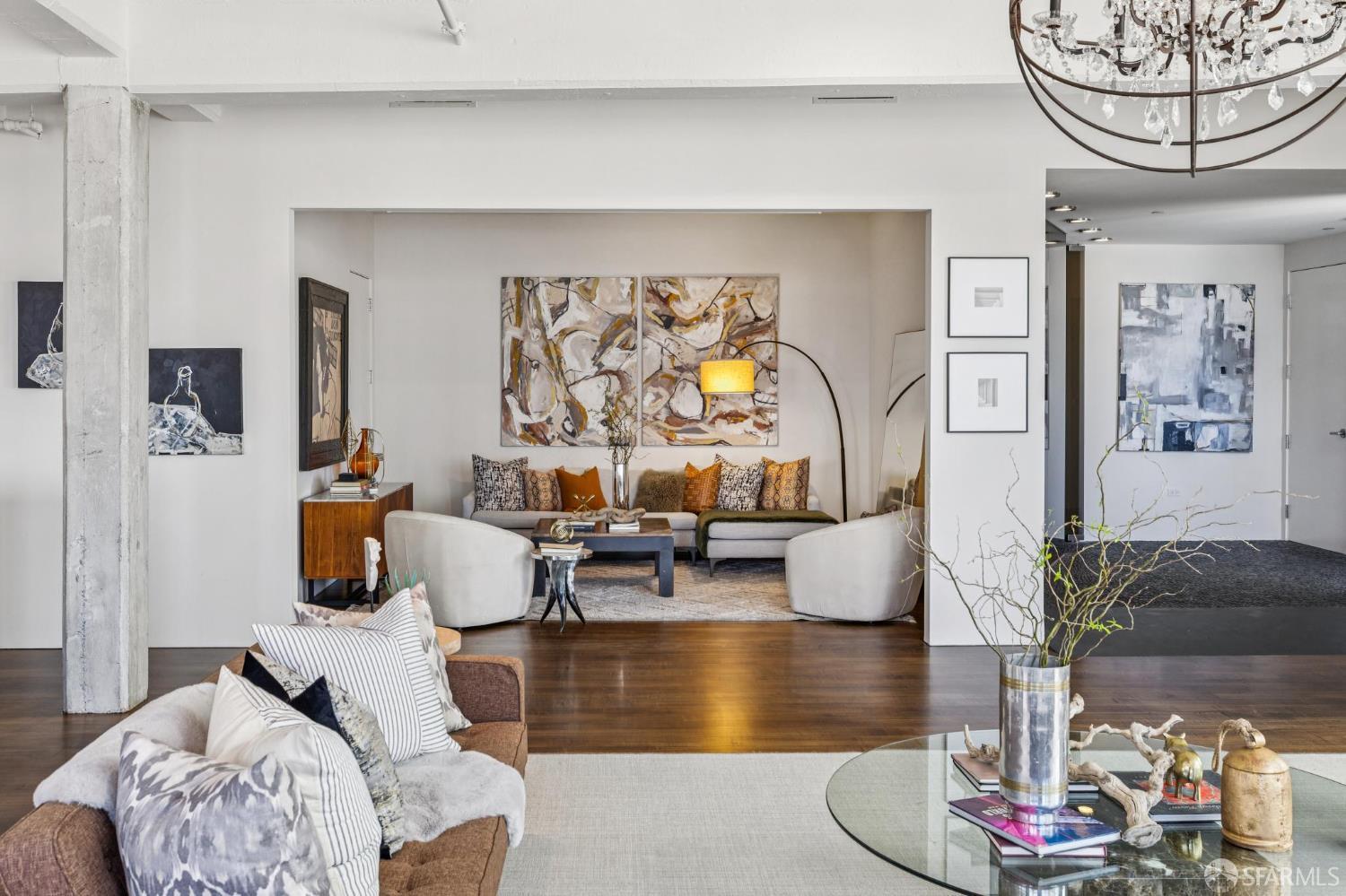 6 Mint Plaza, Unit 900A San Francisco, CA 94103 - Photo 23 of 55 a living room with furniture and a floor to ceiling window
