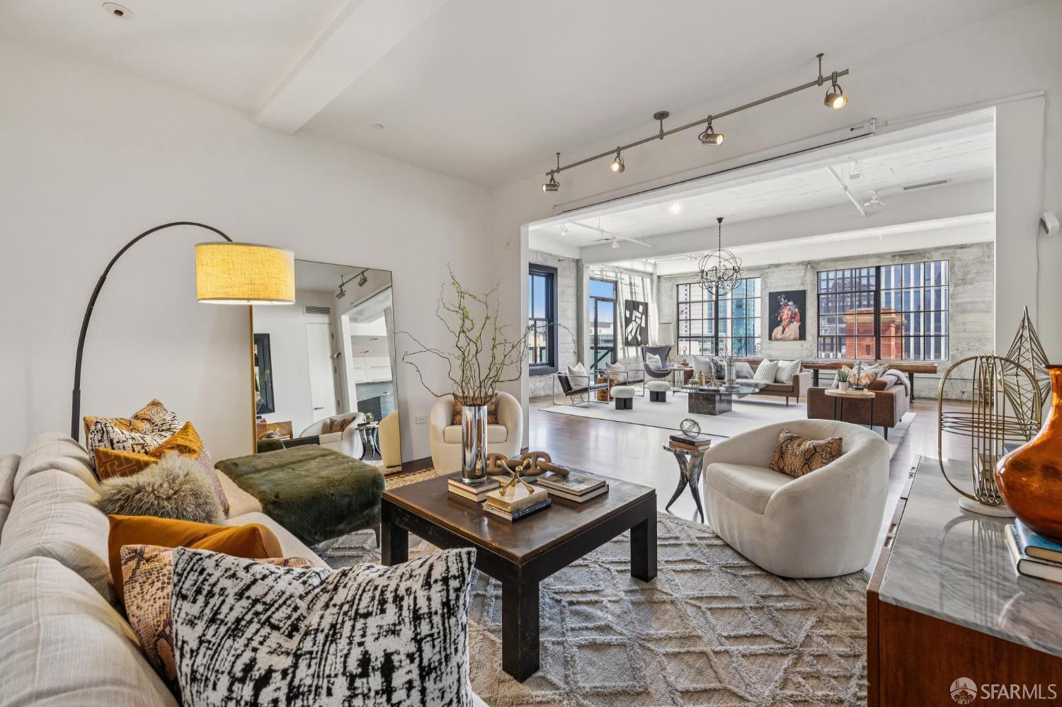 6 Mint Plaza, Unit 900A San Francisco, CA 94103 - Photo 25 of 55 a living room with furniture and a potted plant