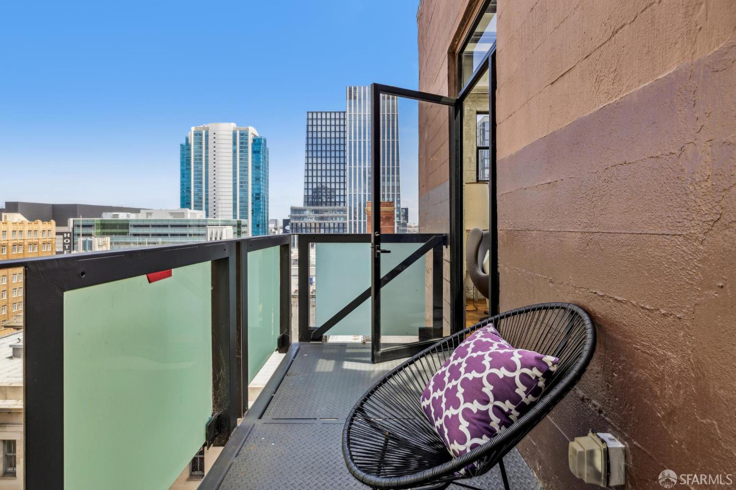 6 Mint Plaza, Unit 900A San Francisco, CA 94103 - Photo 26 of 55 a balcony with furniture and a potted plant