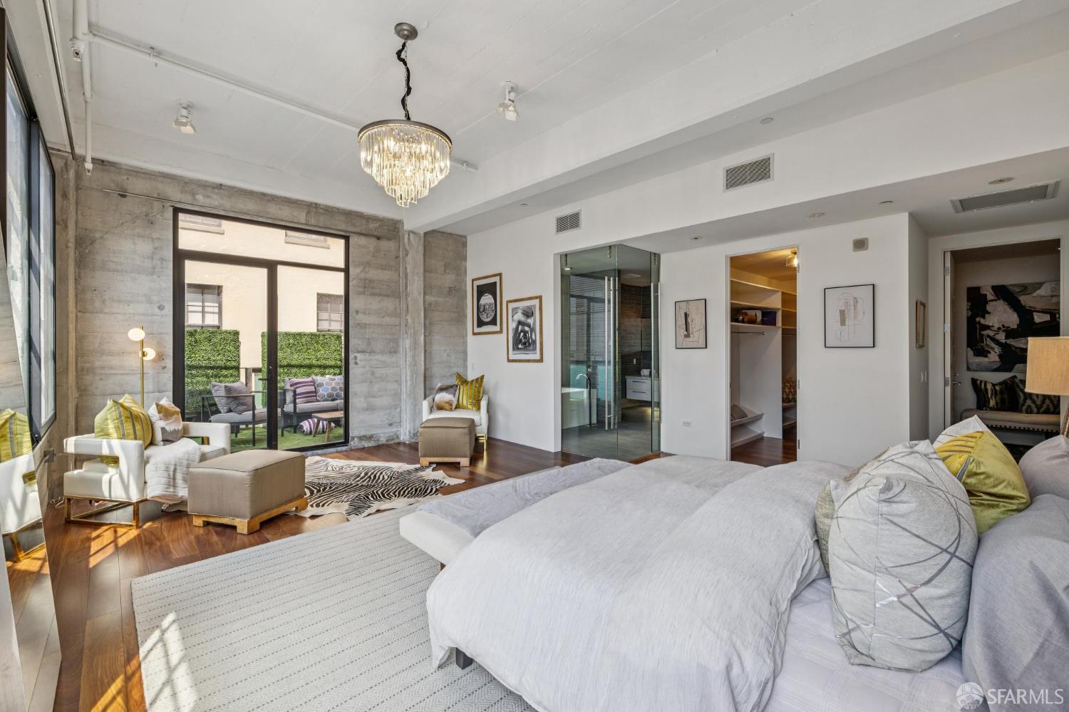 6 Mint Plaza, Unit 900A San Francisco, CA 94103 - Photo 29 of 55 a large bedroom with bed and large windows