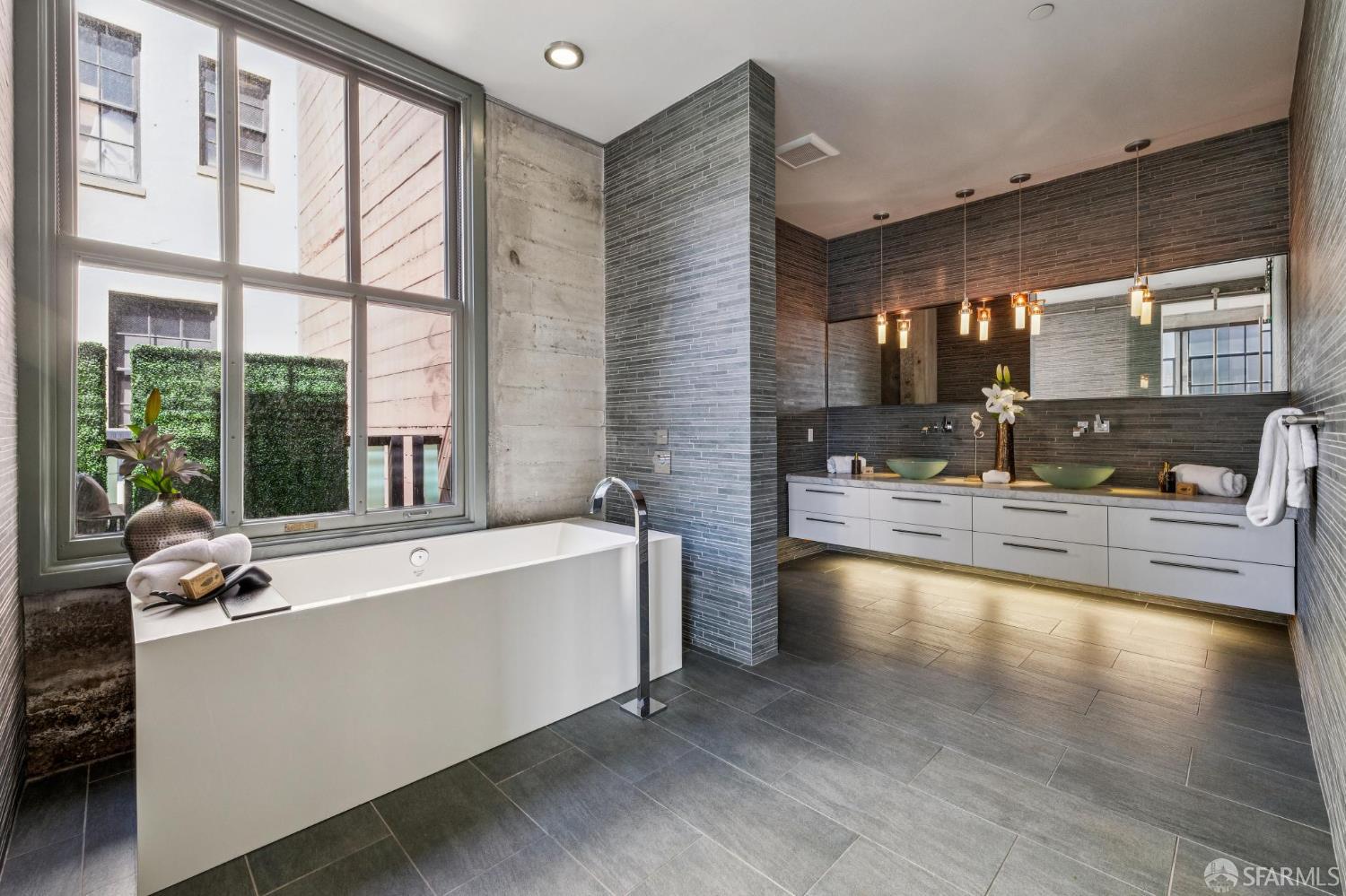 6 Mint Plaza, Unit 900A San Francisco, CA 94103 - Photo 32 of 55 a view of living room with granite countertop furniture and fireplace