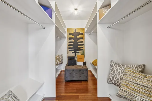 a kitchen with a cabinets and chandelier