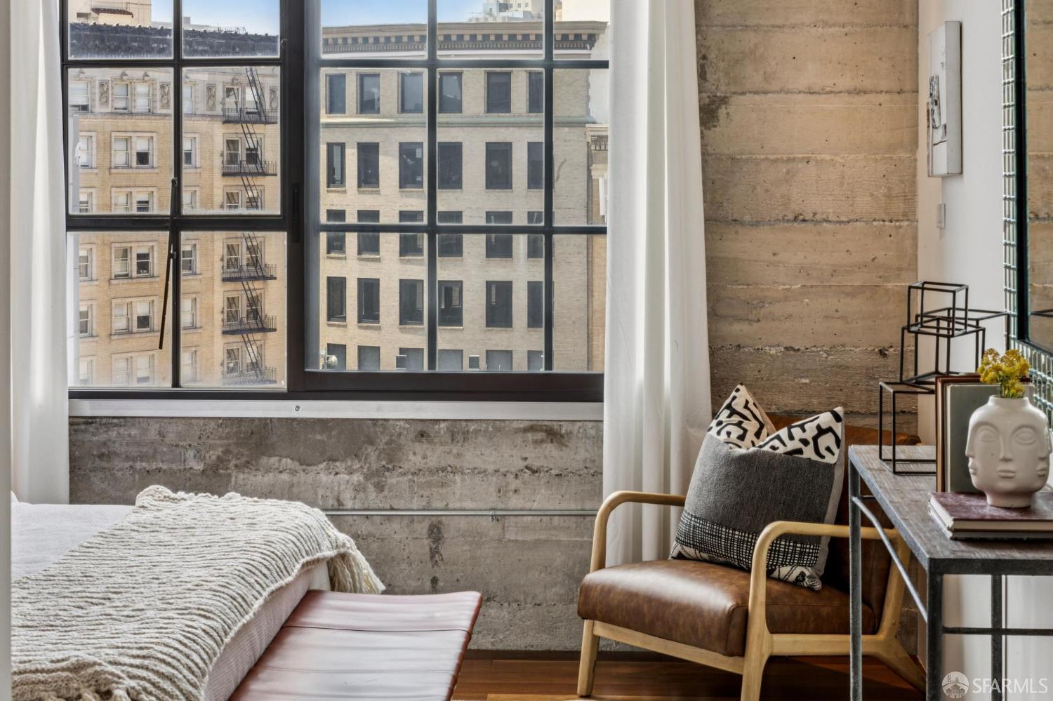 6 Mint Plaza, Unit 900A San Francisco, CA 94103 - Photo 43 of 55 a bedroom with a bed and wooden floor