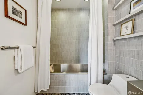 a picture of a bench in front of a window