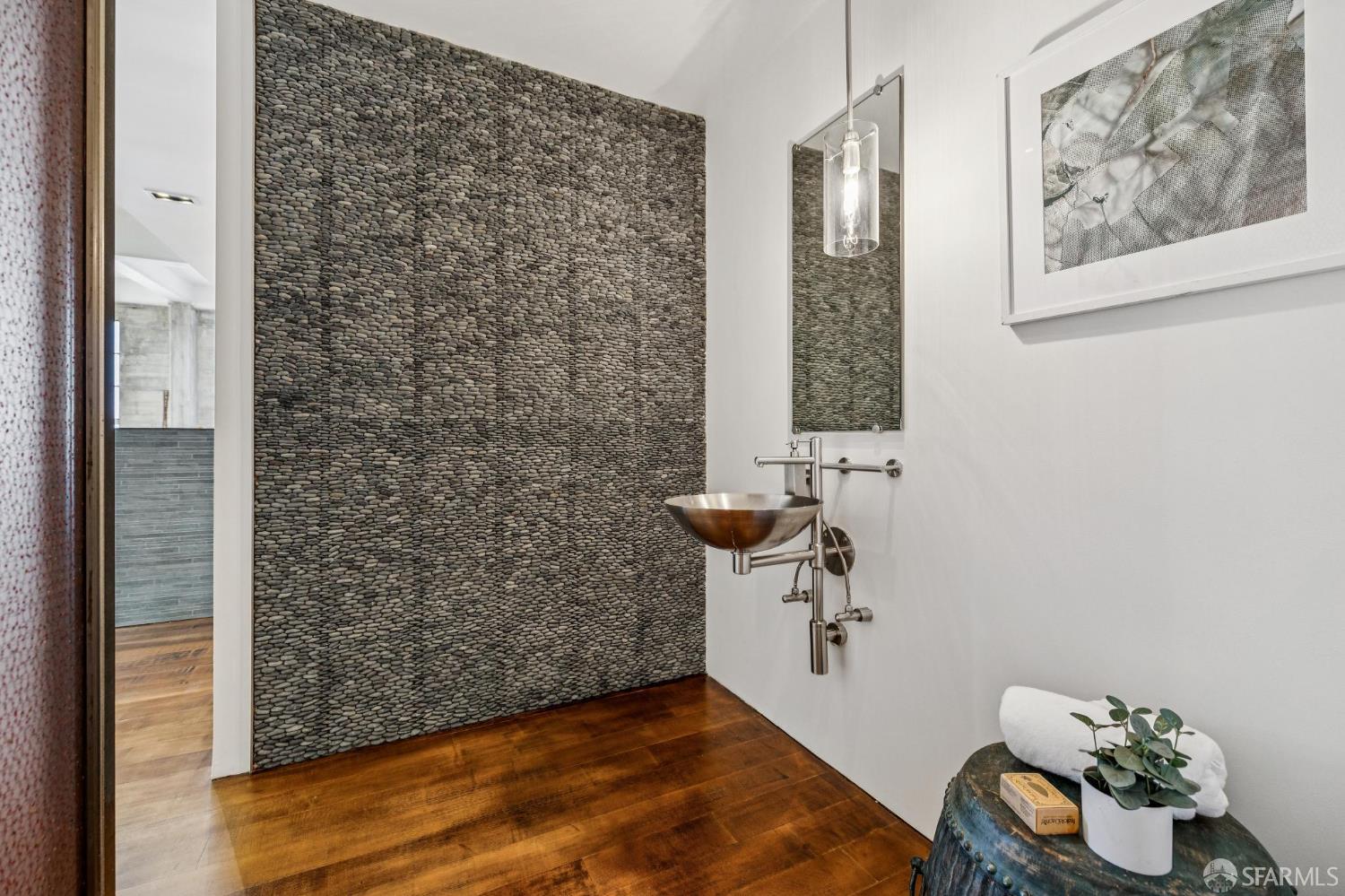 6 Mint Plaza, Unit 900A San Francisco, CA 94103 - Photo 46 of 55 a bathroom with a sink and a mirror