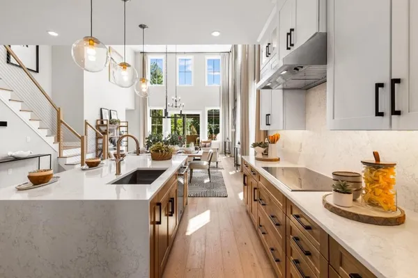 a large kitchen with lots of counter space and window