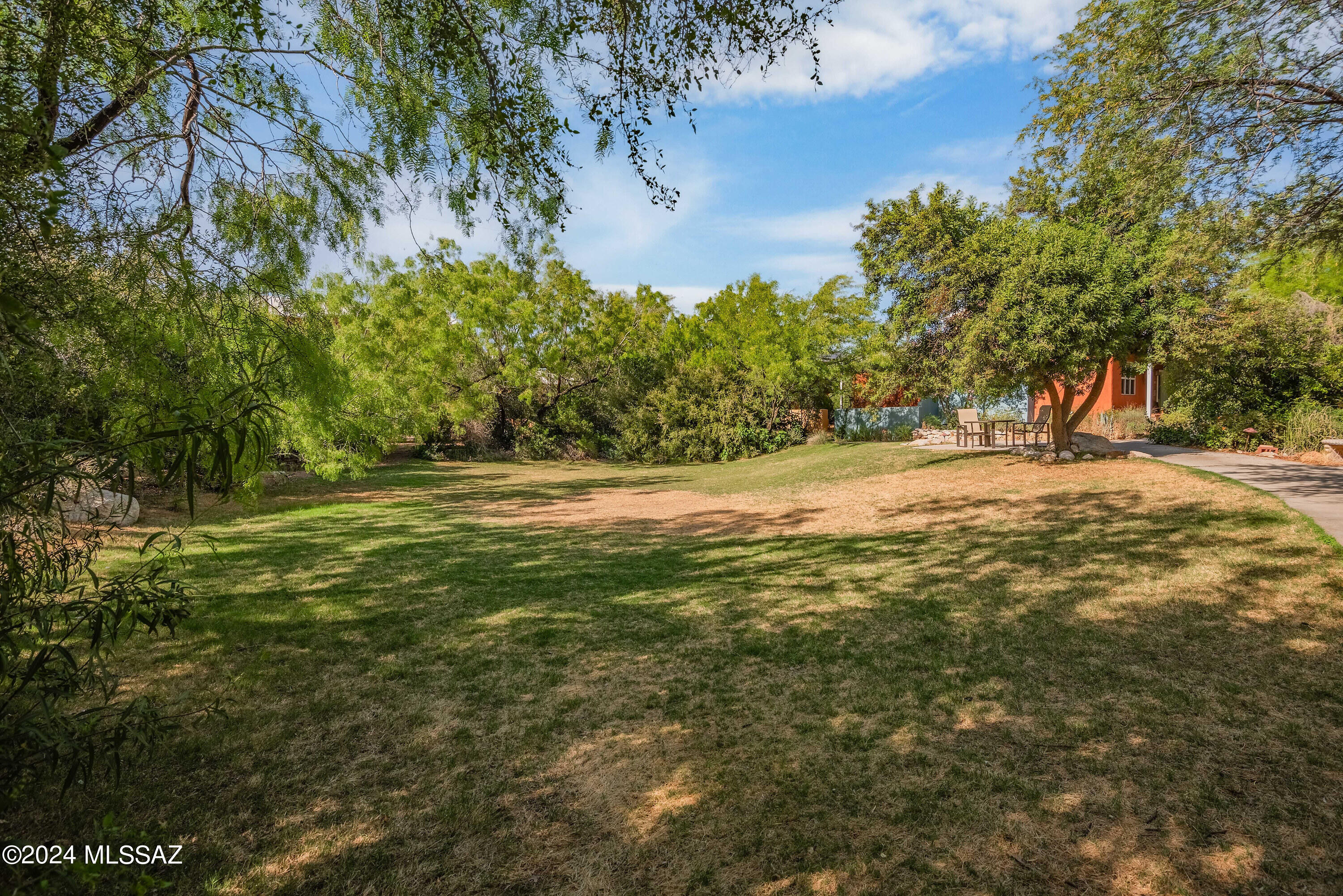 523 East Roger Road Tucson, AZ 85705 - Photo 35 of 40 a view of outdoor space with trees all around