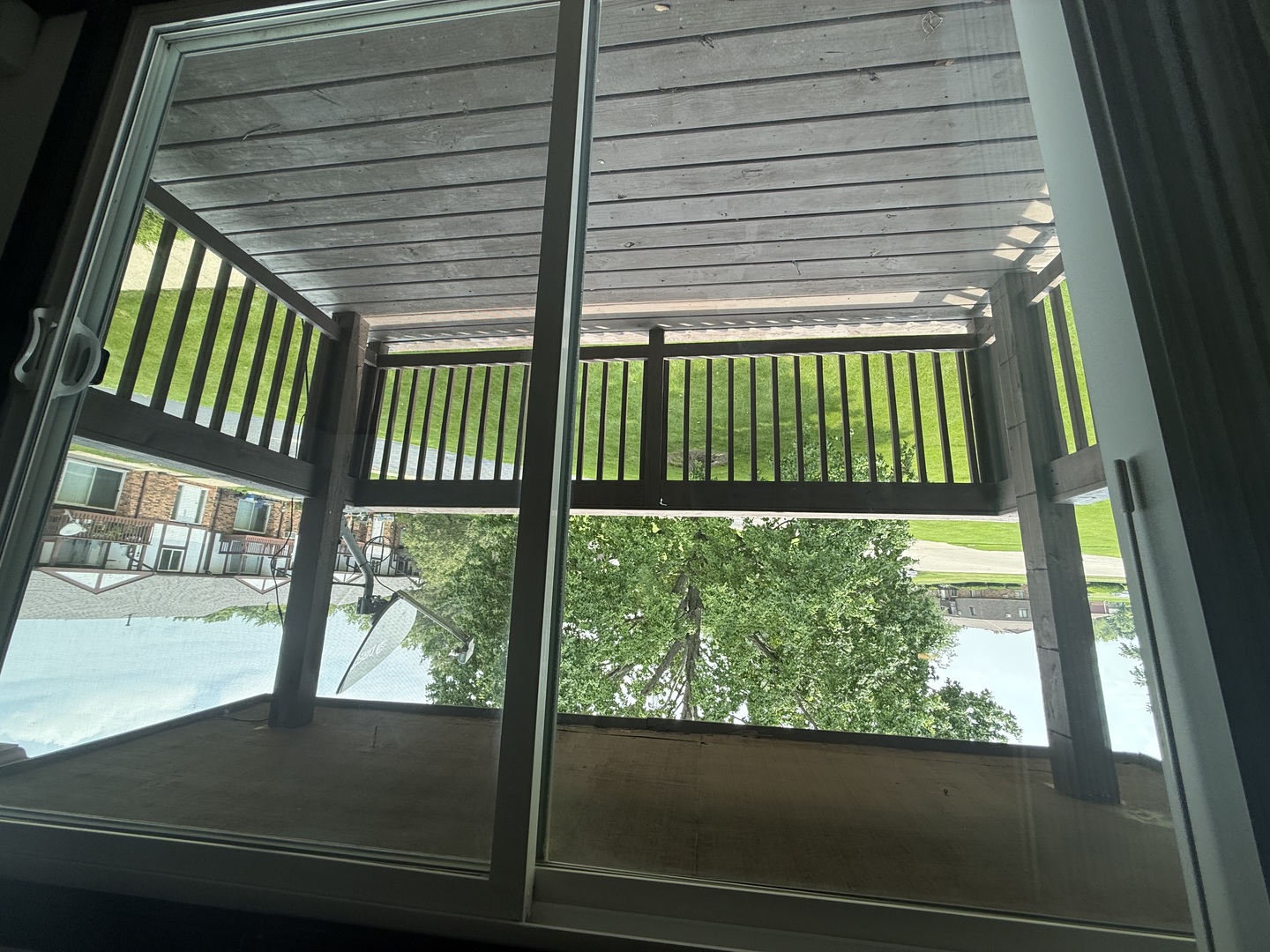 1032 Shagbark Road, Unit 2H New Lenox, IL 60451 - Photo 5 of 6 a view of a porch in the balcony