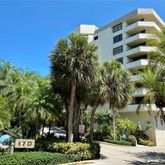 front view of a building with a garden