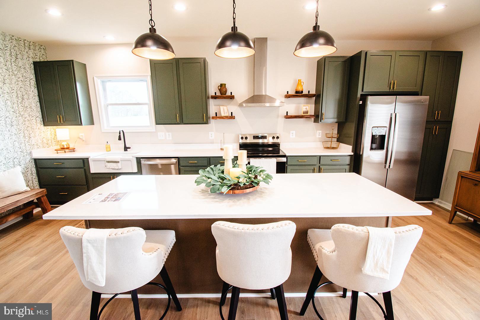 362 Drummer Hill Road Front Royal, VA 22630 - Photo 12 of 48 a dining table with chairs and wooden floor