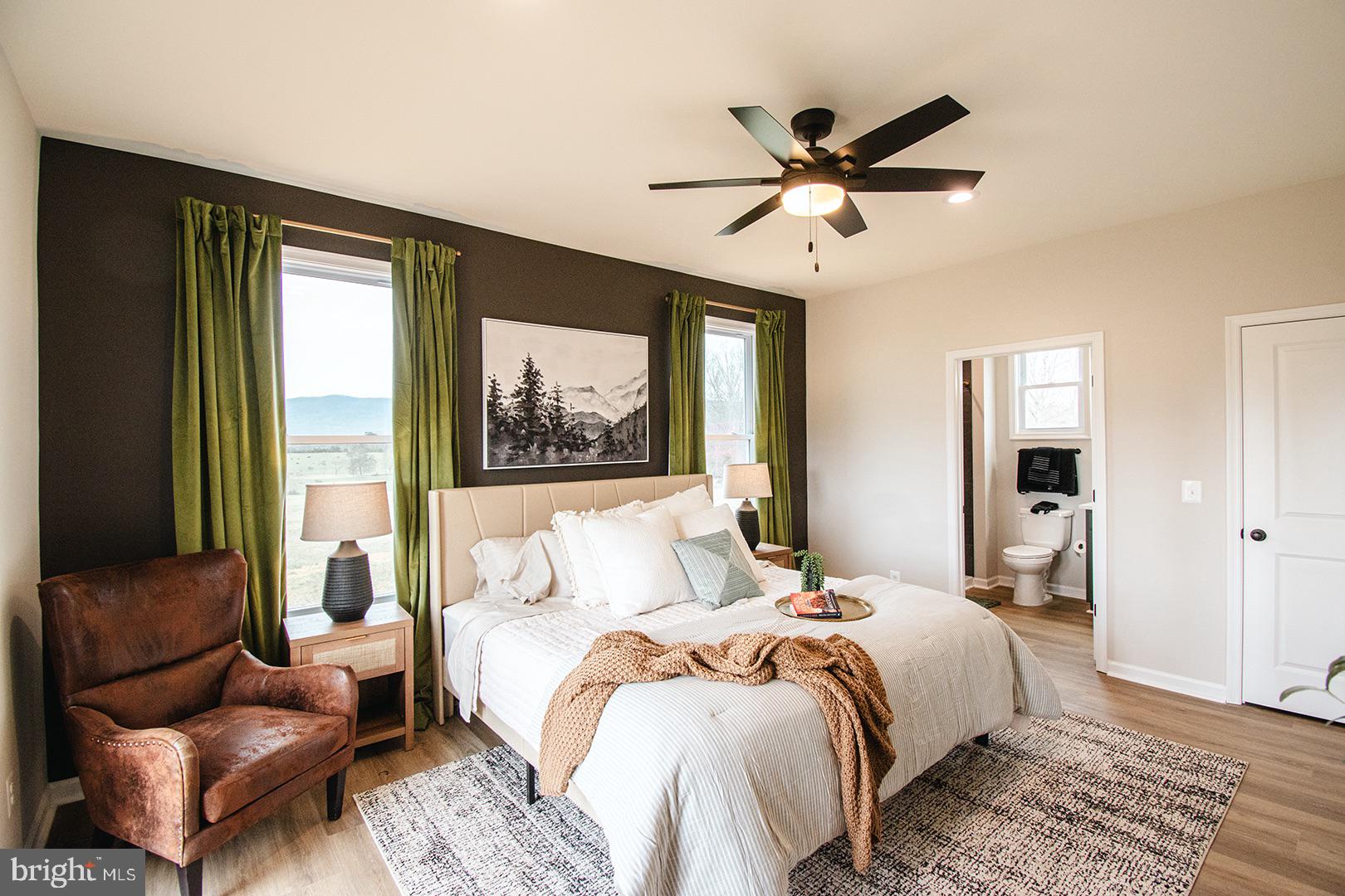 362 Drummer Hill Road Front Royal, VA 22630 - Photo 20 of 48 a bedroom with a large bed and a window