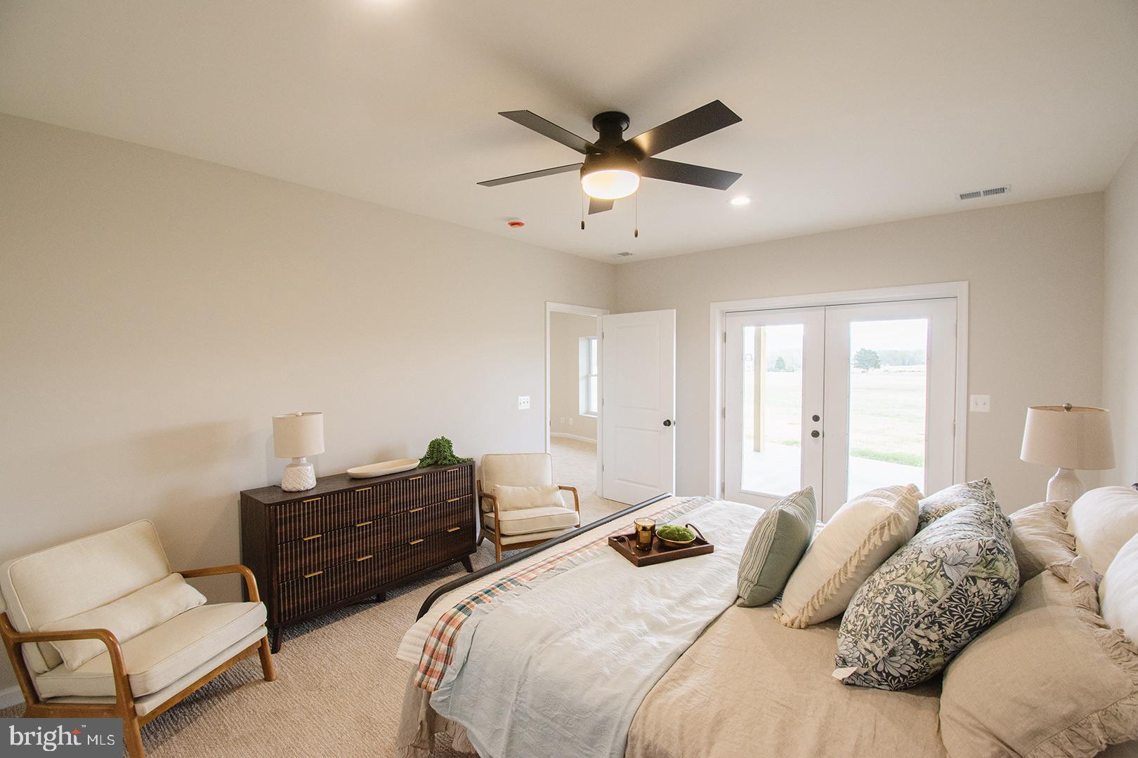362 Drummer Hill Road Front Royal, VA 22630 - Photo 22 of 48 a bedroom with a bed window and couch
