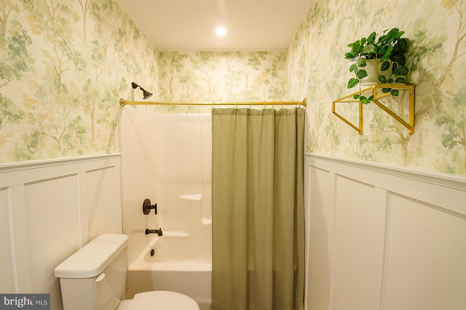 362 Drummer Hill Road Front Royal, VA 22630 - Photo 26 of 48 a bathroom with a shower curtain and a sink