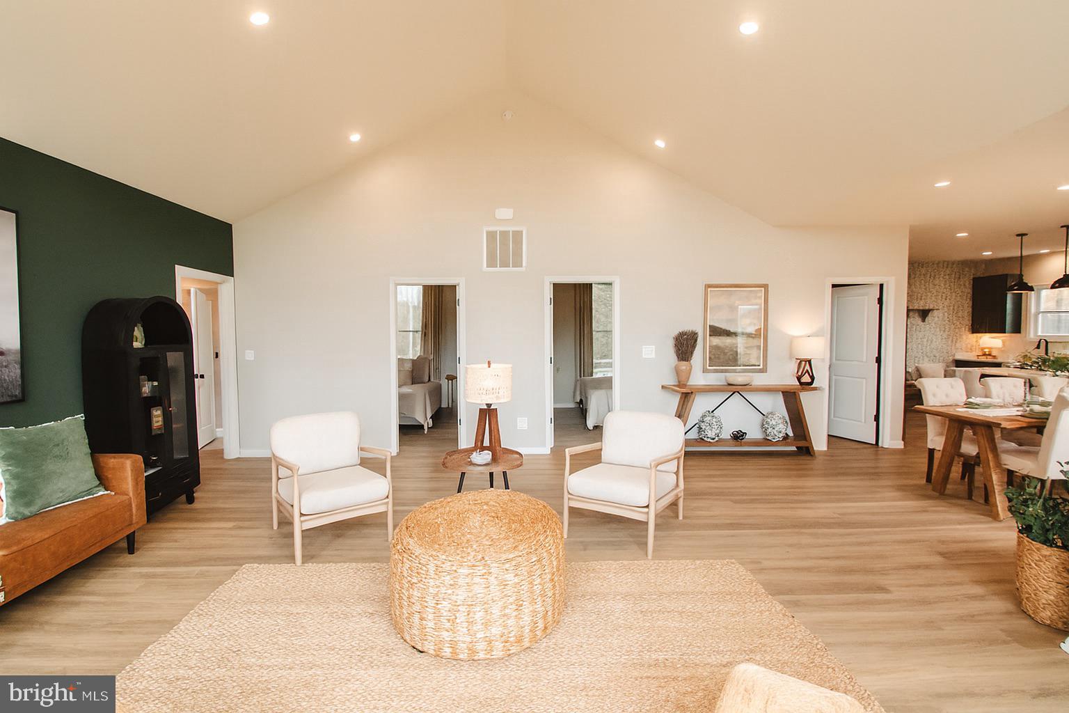 362 Drummer Hill Road Front Royal, VA 22630 - Photo 27 of 48 a living room with furniture and a dining table with kitchen view