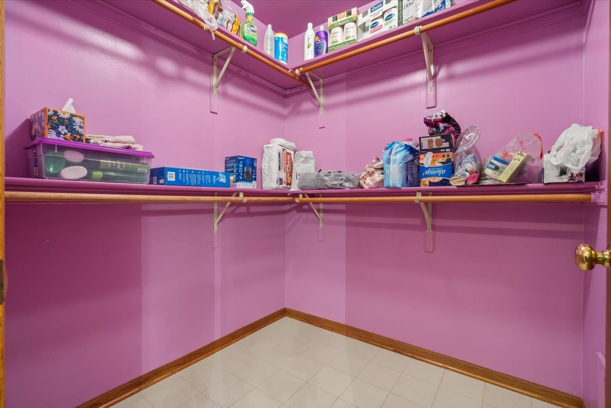 703 Newcastle Lane Prospect Heights, IL 60070 - Photo 28 of 45 a view of a room with racks on the wall