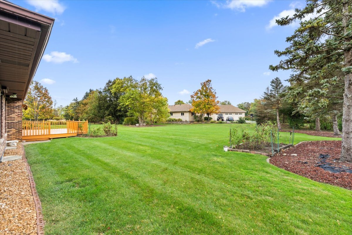 703 Newcastle Lane Prospect Heights, IL 60070 - Photo 39 of 45 a view of yard with swimming pool and green space